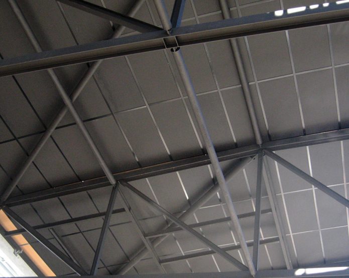 Compressed straw ceiling panel being used in a convention centre