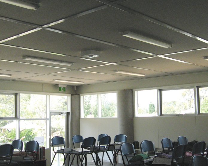 Compressed Straw Panel used in a ceiling system in a school classroom